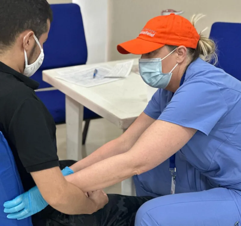 Jessica Christiansen Checking up Patient at the Columbia Mission Trip