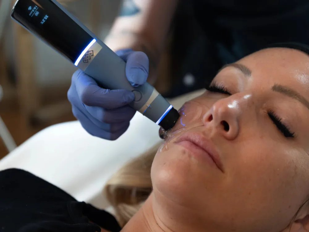 Doing Exion Face Treatments - Vigeo Care center & Aesthetics In Algonquin IL