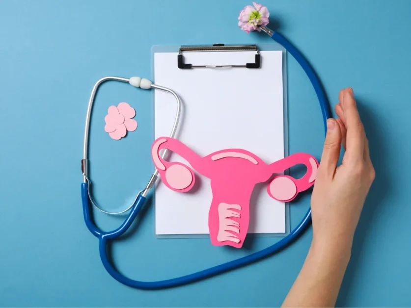 medical blank note pad with stethoscope and ovary illustration representing women’s health services